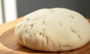 Ile wyrasta ciasto na pizzę? Odkryj sekrety idealnego wyrastania