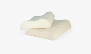 Two ergonomic pillows designed for neck pain relief. These almohadas para dolor de cuello offer contoured support for a comfortable sleep.
