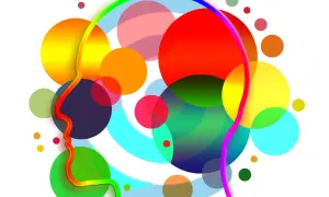 Abstract hoofdprofiel omringd door kleurrijke, overlappende cirkels, symbolisch voor hooggevoeligheid en angst.