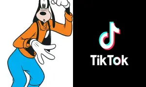 Goofy w pomarańczowej bluzie i niebieskich spodniach, obok logo TikTok. Goofy ahh, jakby tańczył do viralowego trendu.