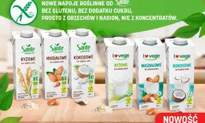 Rzędy kartonów z napojami roślinnymi Sante i I love vege: ryżowe, migdałowe, kokosowe.