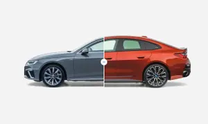 Porównanie wymiarów samochodów osobowych: szare Audi i pomarańczowe BMW.