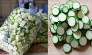 Zucchine tagliate a cubetti in sacchetti e a rondelle su un tagliere. Scopri quanto durano le zucchine cotte in frigo per conservarle al meglio.