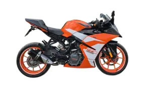 Pomarańczowy KTM RC 125, gotowy do osiągnięcia swojej v max. Sportowy wygląd i dynamiczna sylwetka.