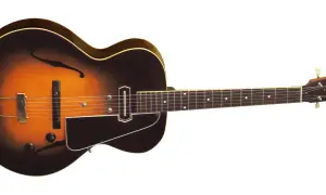 Klasyczna gitara jazzowa z przetwornikiem, przypominająca pierwszą gitarę elektryczną.