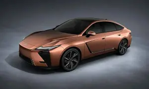 Miedziany Lexus ES 2026 z czarnym dachem i futurystycznymi światłami.