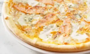 Pizza saumon : la recette crémeuse et ses secrets pour réussir