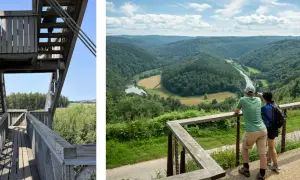 Vue panoramique d'une vallée verdoyante et d'une rivière, depuis une plateforme d'observation. Idéal pour une randonnée bouillon.
