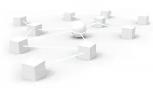 Un réseau de cubes blancs connectés par des lignes lumineuses, évoquant une technologie comme le Velux Z-Wave pour une maison intelligente.
