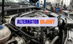 Silnik samochodu z widocznym alternatorem, który ładuje akumulator. Napis "ALTERNTOR OBJAWY" sugeruje problemy z ładowaniem.