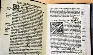 12 Artikel der Bauern. Ein alter Druck mit kunstvollen Initialen und Text in deutscher Sprache.