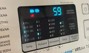 Wyświetlacz pralki Samsung z ikonami: bęben, wirowanie, wyciszenie. Czas 59 minut.