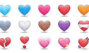 Różnorodne serca emoji: zielone, niebieskie, różowe, czerwone, pomarańczowe, żółte, czarne, szare, białe, brązowe, fioletowe, z flagą, w ogniu, złamane, z kokardą, przeszyte strzałą. Poznaj znaczenie serc emoji!