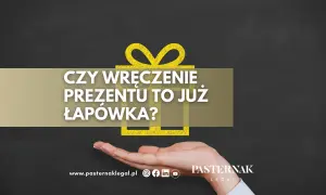 Czy wręczenie prezentu to już łapówka? Dłoń trzyma symbol prezentu, a tekst pyta o granicę między gestem a nielegalnym działaniem.