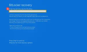 Ekran odzyskiwania BitLocker. Wpisz swój klucz odzyskiwania BitLocker, aby odblokować dysk.