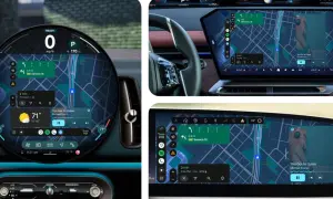 Nowoczesny kokpit z nawigacją i muzyką, pokazujący funkcje android auto na telefonie.