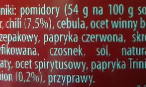 Sos z pomidorów, cukru, cebuli, czosnku i papryki Trinidad Scorpion (0,2%) z nutą chili.