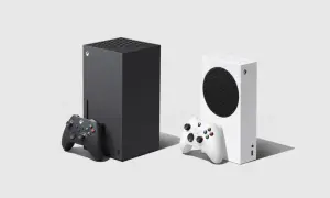 Czarna i biała konsola Xbox Series X z kontrolerami.