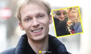 Igor Herbut z żoną na zdjęciu. Uśmiechnięty wokalista i jego ukochana w słoneczny dzień.