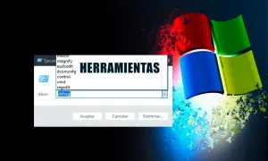Ventana de comandos de Windows con "defrag" escrito, lista de herramientas y el logo de Windows.