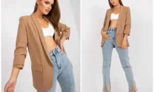Modelka w beżowej marynarce i białym topie, prezentująca stylizację co pod marynarkę damską.