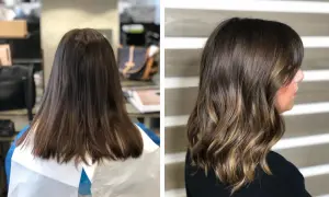 Capelli castani trasformati con schiariture delicate e onde morbide, un perfetto effetto tono su tono.