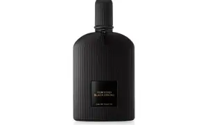 Elegancka, czarna butelka perfum Tom Ford Black Orchid, z charakterystycznymi pionowymi żłobieniami i złotą etykietą.