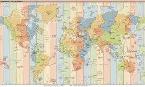 Mapa stref czasowych świata, gdzie Polska znajduje się w strefie +1 od GMT.
