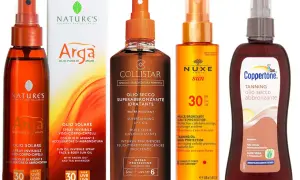 Vari oli abbronzanti, tra cui Nature's, Collistar, Nuxe e Coppertone, mostrano come funziona l'olio abbronzante per una pelle dorata e protetta.
