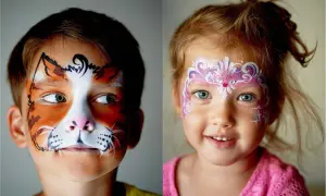 Zabawne **schminken kinder**: Junge als Tiger, Mädchen als Prinzessin. Bunte Gesichter voller Fantasie.