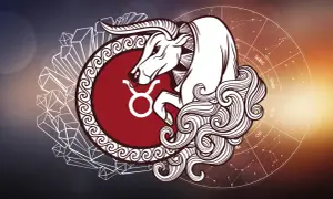 Byk, symbol zodiaku majowy, w otoczeniu kryształów i koła z gwiazdozbiorami.