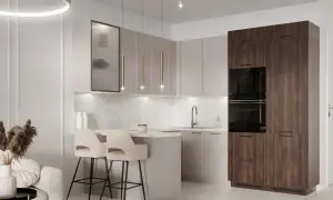 Elegancka kuchnia modern classic z wyspą, dwoma hokerami i wysoką zabudową z piekarnikami.