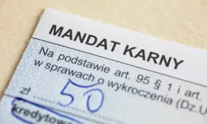 Fragment mandatu karnego z kwotą 50 zł.