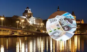 Szczecin nocą, most, rzeka i polskie banknoty.