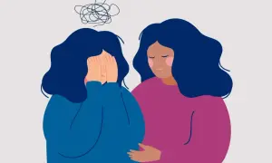 Dwie kobiety. Jedna zakrywa twarz dłońmi, nad nią kłębek splątanych myśli symbolizujący epizod psychotyczny. Druga obejmuje ją z troską.