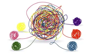 Un groviglio di fili colorati rappresenta la complessità della mente. Chi va dallo psicologo cerca di districare i propri pensieri, uno alla volta, per ritrovare serenità.