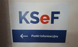 Znak KSeF z napisem "Punkt informacyjny" i strzałką w lewo.
