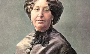 Portret George Sand, francuskiej pisarki, w eleganckiej sukni z koronkowym kołnierzem.
