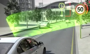 Sistema di riconoscimento della segnaletica stradale: un'auto rileva un segnale di limite di velocità di 50 km/h e un segnale di avviso.