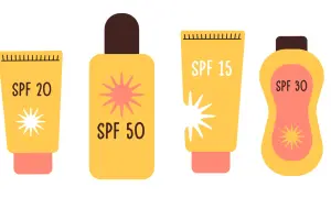 Cztery opakowania kremów z filtrem: SPF 20, SPF 50, SPF 15 i SPF 30. Dowiedz się, co to SPF i jak chroni skórę.