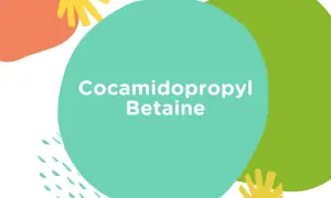 Kolorowe kształty i tekst "Cocamidopropyl Betaine". Ten składnik jest łagodny i często używany w kosmetykach.