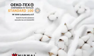 Certyfikat OEKO-TEX Standard 100 na białym tle z bawełną. Gwarancja bezpieczeństwa tekstyliów.