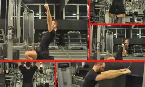 Uomo in palestra esegue esercizi per la schiena, concentrandosi sull'allenamento dell'upper back con macchine e cavi.