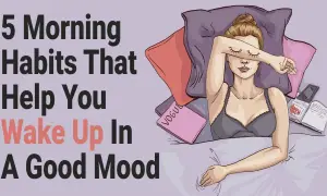 Learn how to wake up happy with 5 morning habits. A woman in bed covers her eyes, suggesting a need for a better start to the day.