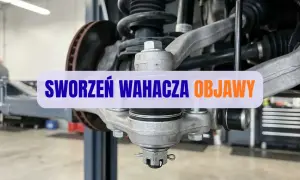 Widok na zawieszenie samochodu, gdzie widoczny jest sworzeń wahacza.