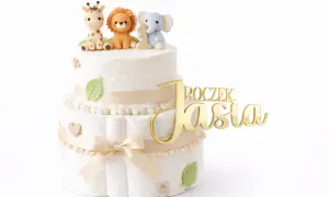 Złoty topper na roczek z imieniem Jasia, ozdobiony figurkami zwierzątek z safari.