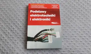 Podręcznik "Podstawy elektrotechniki i elektroniki" z ilustracją wiązki przewodów. Idealny dla przyszłych mechaników pojazdów samochodowych.