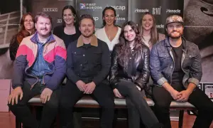 A group of musicians, including Alysa Vanderheym, pose for a photo at an event sponsored by SESAC, ASCAP, BMI, and Pinnacle Financial Partners.