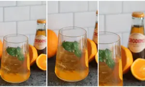 Erfrischender Crodino Spritz mit Eis, Minze und Orangenstücken. Perfekt für einen sonnigen Nachmittag.