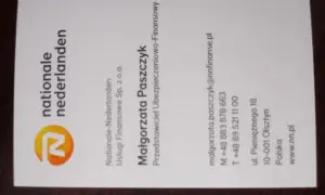 Wizytówka z logo Nationale-Nederlanden i danymi kontaktowymi Małgorzaty Paszczyk, przedstawicielki ubezpieczeniowo-finansowej w Olsztynie.